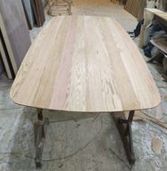 Rectangular table with curved corners