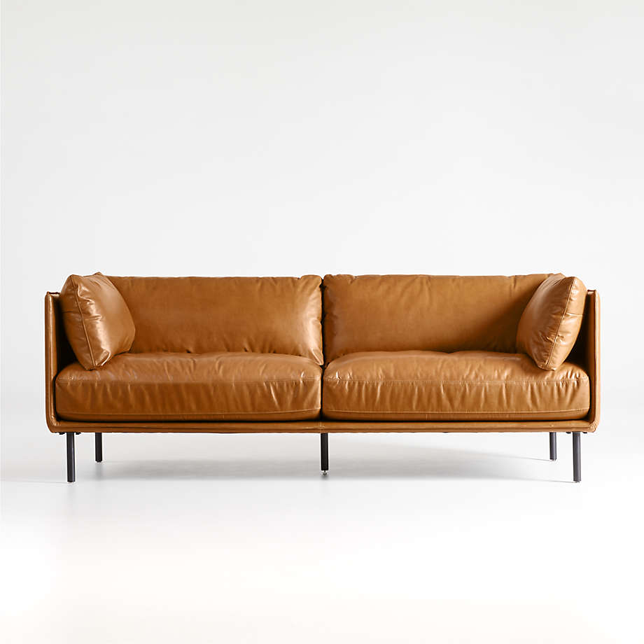 Slim Leather Sofa With Puffy Cushions and Sleek Iron Legs 0