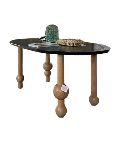 Bombona Black Oval Dining Table With Sculpted Wooden Legs 0