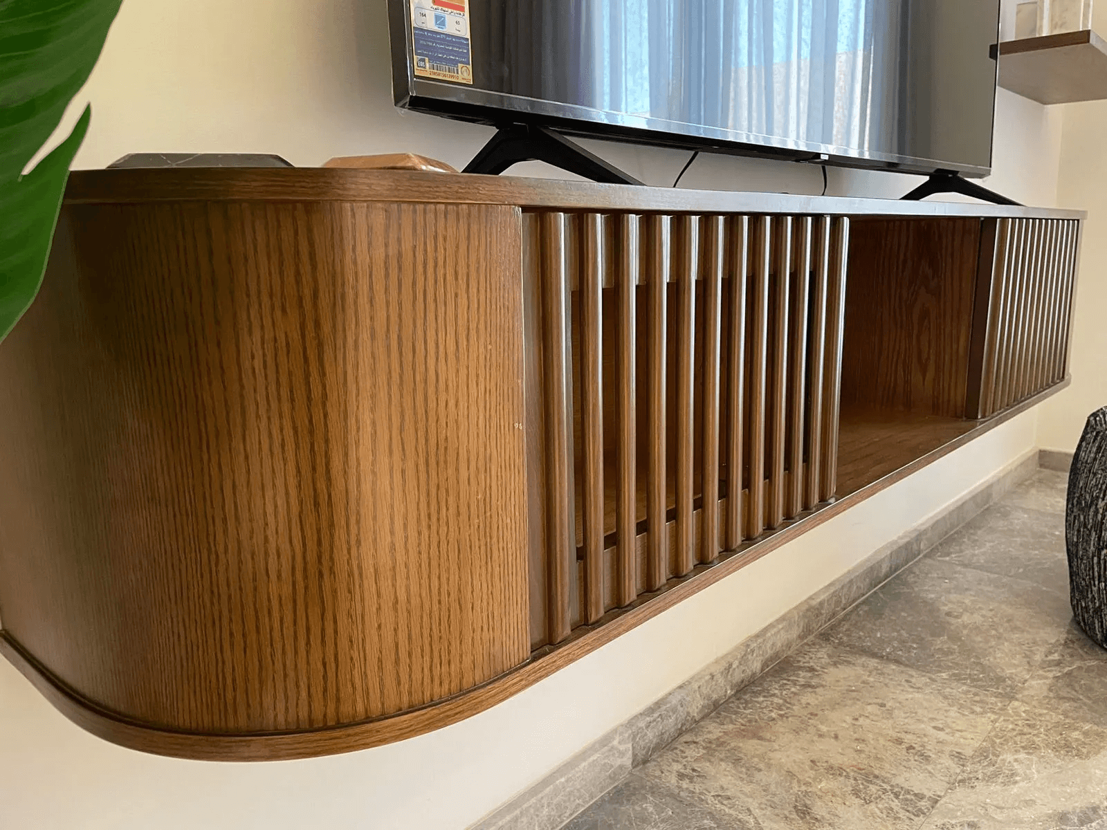 Paige Curved Wall-Mounted TV Unit With Slatted Design 1