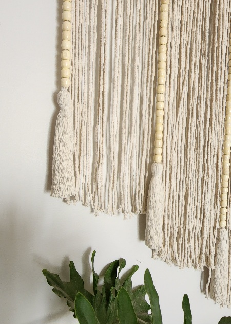 A Wall Hanging With Wood Beads 1